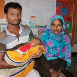 Golapy, her husband Manik and their baby attend a check up at the Union Health & Family Welfare Centre in Bangladesh